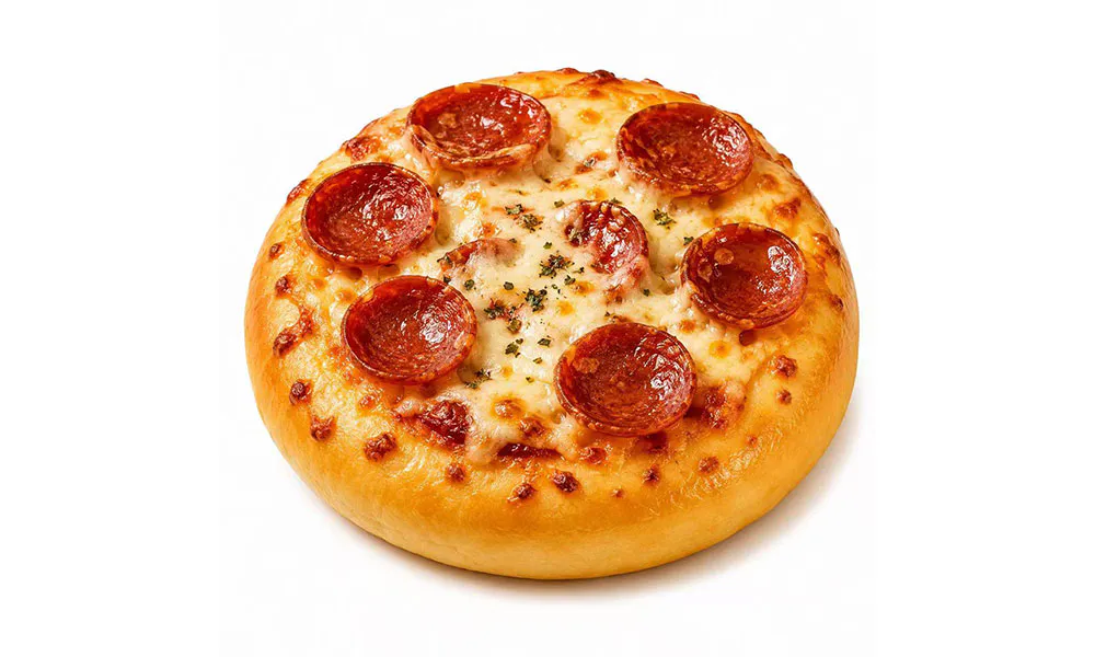 Mini pepperoni pizza bun topped with melted cheese, cured pepperoni slices and herb flakes at Sweet Cottage Cafe, a Dessert shop in Lexington